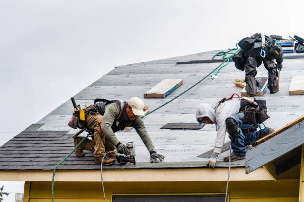 Professional Gutter Installation technician working in Garfield, NJ